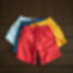 Stylish shorts in various colors displayed on a wooden surface