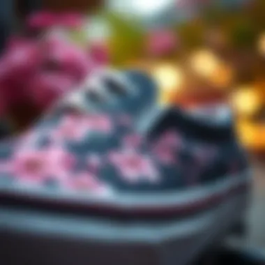 Close-up of the intricate cherry blossom design on Vans slip-ons