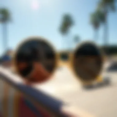Close-up of circle rim sunglasses reflecting skate park scene
