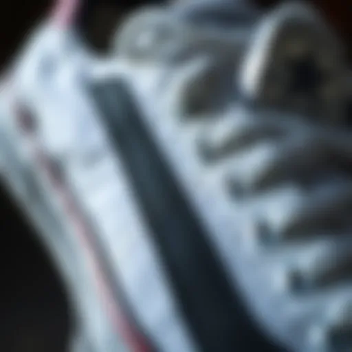 Close-up view of the Converse White Black Stripe skate shoe showcasing the fabric and design details