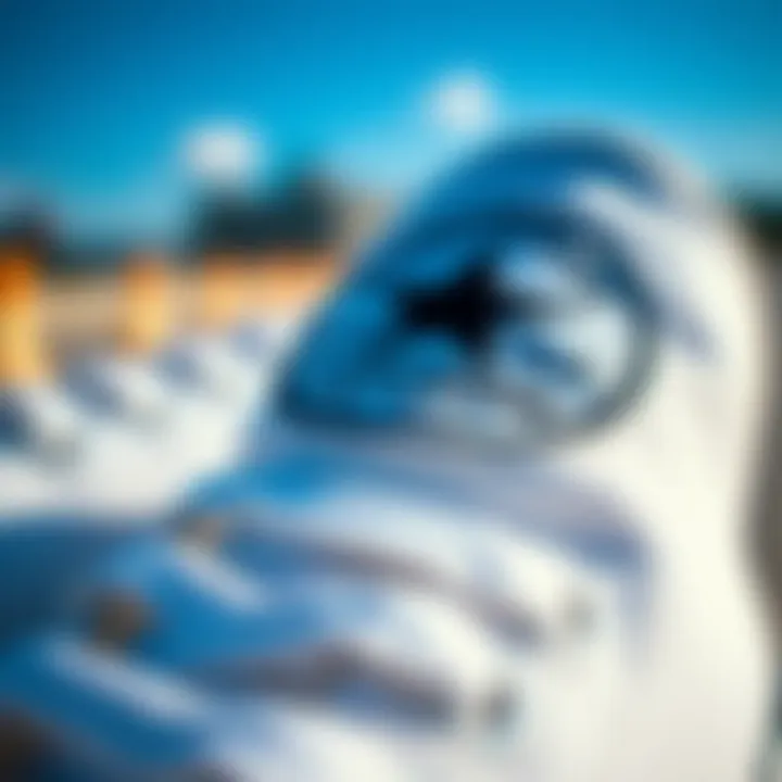 Close-up of Converse logo on white canvas shoes