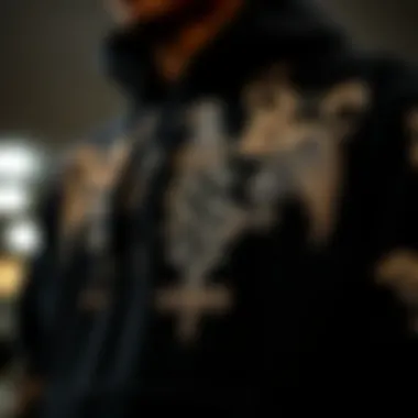 Intricate Design of the Crooks and Castles Black Hoodie Close-up view of the intricate design details on the Crooks and Castles black hoodie