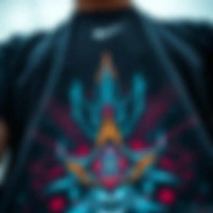 The Art of Graphic Expression Close-up of the unique design elements of a black blue graphic tee.