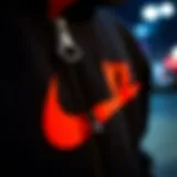 A close-up view of the black Nike zip-up sweatshirt showcasing its fabric and zipper details.