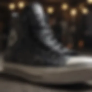 Close-up of black high top Converse detailing