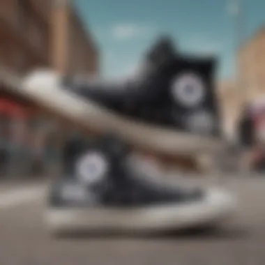 Stylish black high top Converse on a skateboard