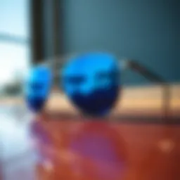 Stylish blue flash aviators on a reflective surface