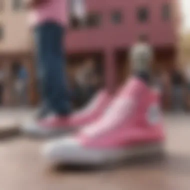 Influence of Chuck Taylor All Star Classic Pink among Skateboarders Group of skateboarders discussing the influence of Chuck Taylor All Star Classic Pink.