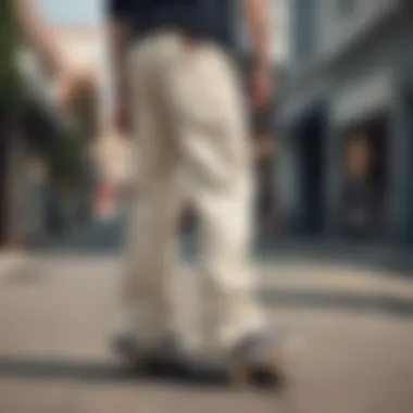 Skateboarding in Dickies Carpenter Pants Dynamic action shot of a skateboarder wearing Dickies Off White Carpenter Pants