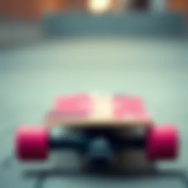 Stylish skateboard deck featuring pink and black aesthetics