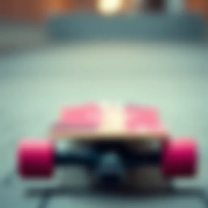 Stylish skateboard deck featuring pink and black aesthetics