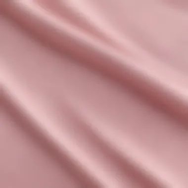 Fabric Quality of Light Pink Nike Shorts Close-up view of the fabric texture of light pink Nike shorts, highlighting quality and durability