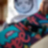 A skateboarder showcasing a Neff Custom Goods deck adorned with vibrant graphics.