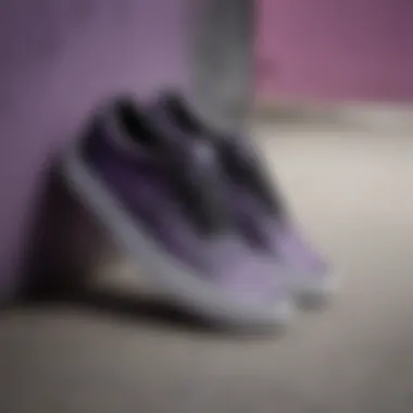 Black and Purple Vans Design Details A close-up of black Vans with purple accents showcasing their intricate design