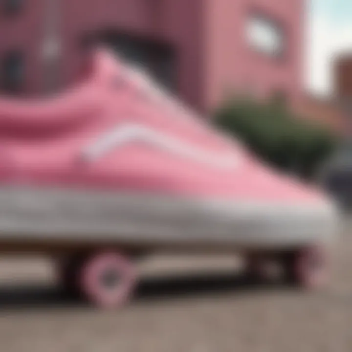 Close-up of pink Vans shoes on a skateboard