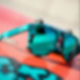 A pair of turquoise sunglasses against a skateboard background