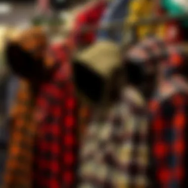 Fashionable arrangement of plaid flannel shirts with hoods on display