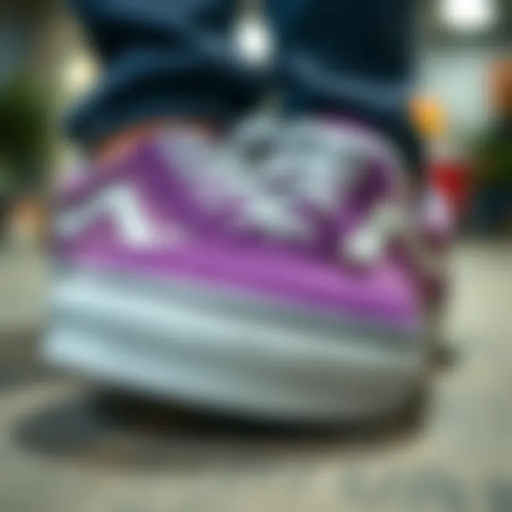 Close-up of purple and white Vans shoes highlighting their design details