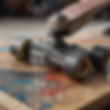 A close-up view of paint splatters and tools used in skateboard art creation