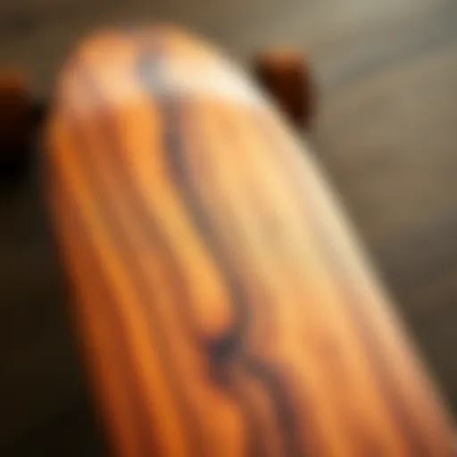 A close-up of a beautifully crafted wooden skateboard deck showcasing its unique grain and finish.