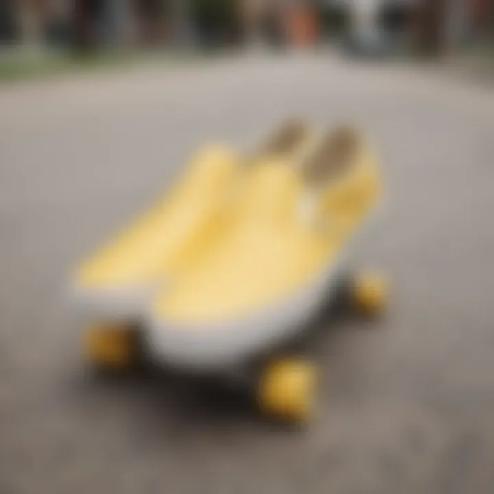 Light yellow slip-on Vans placed on a skateboard