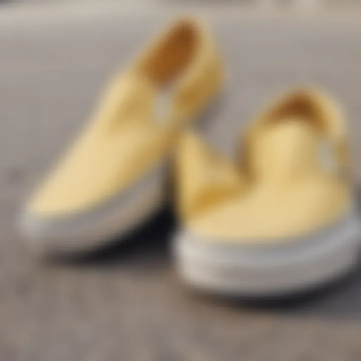 Close-up of the texture and design of light yellow slip-on Vans