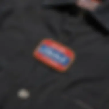 A close-up of the stitching and label of a Dickies shirt, highlighting authenticity.