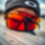 Close-up of Oakley Gascan sunglasses showcasing orange lenses