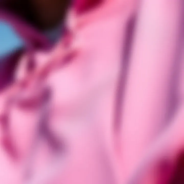 Close-up of the fabric texture of a pink Nike sweatshirt