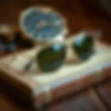 Elegant gold frame sunglasses resting on a vintage book