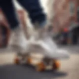 Stylish silver high top Converse on a skateboard