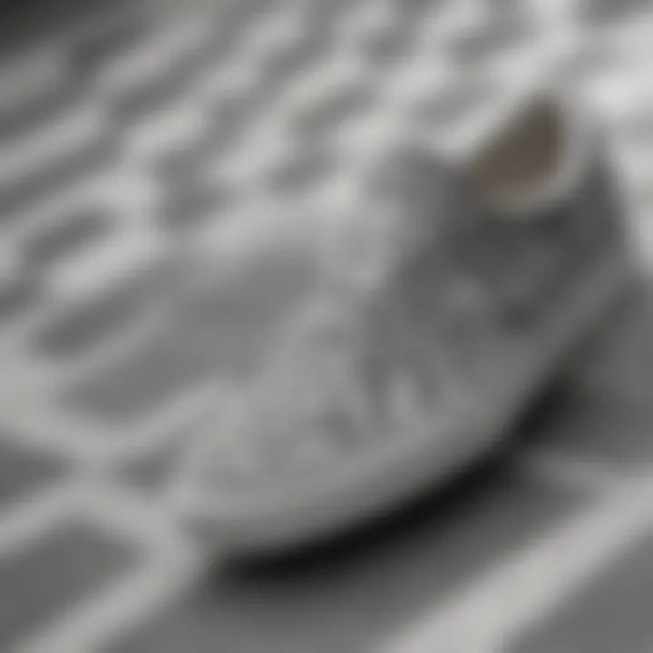 Close-up of the texture of grey checkered Vans