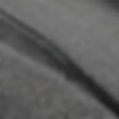 Fabric Texture Analysis of the Grey Nike Zip-Up Close-up of the fabric texture of the grey Nike sweater zip-up