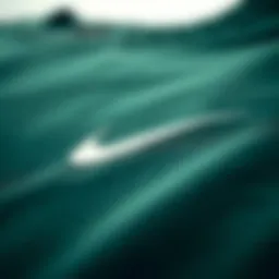 Dark green Nike crew neck showcasing its unique fabric texture