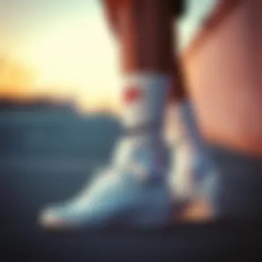 Person showcasing different styles of white Nike tube socks