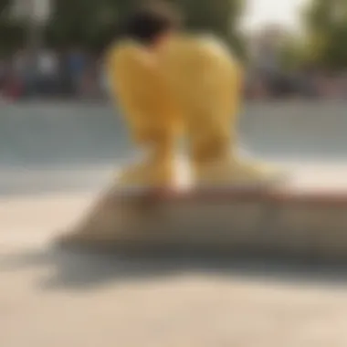 A skateboarder in light yellow slip-on Vans performing tricks at a skate park